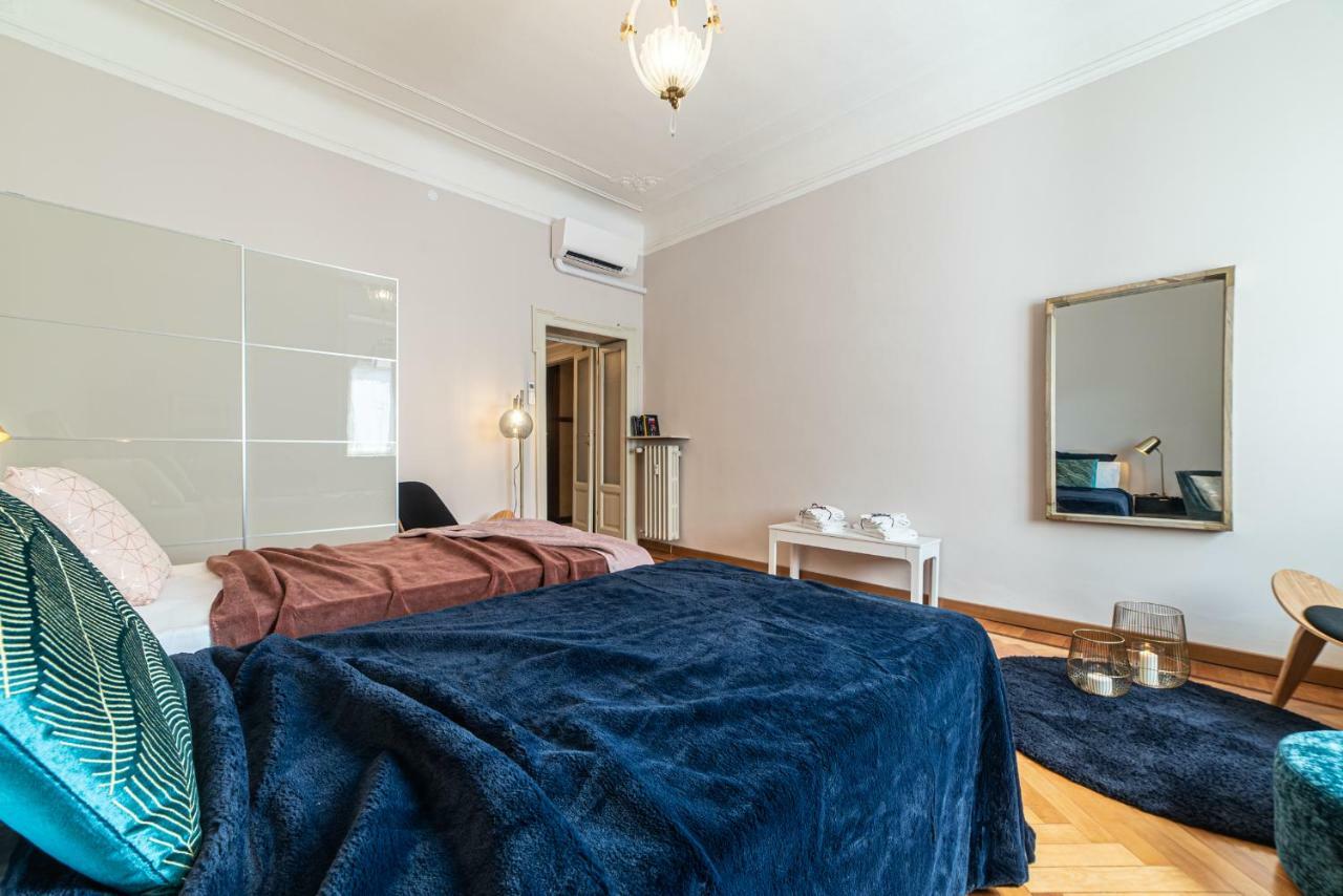 Joivy Sophisticated 3-Bed Flat With Desk Apartment มิลาน ภายนอก รูปภาพ